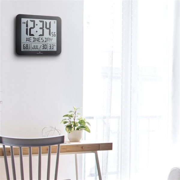 Umbra 12-in Black Ribbon Wall Clock